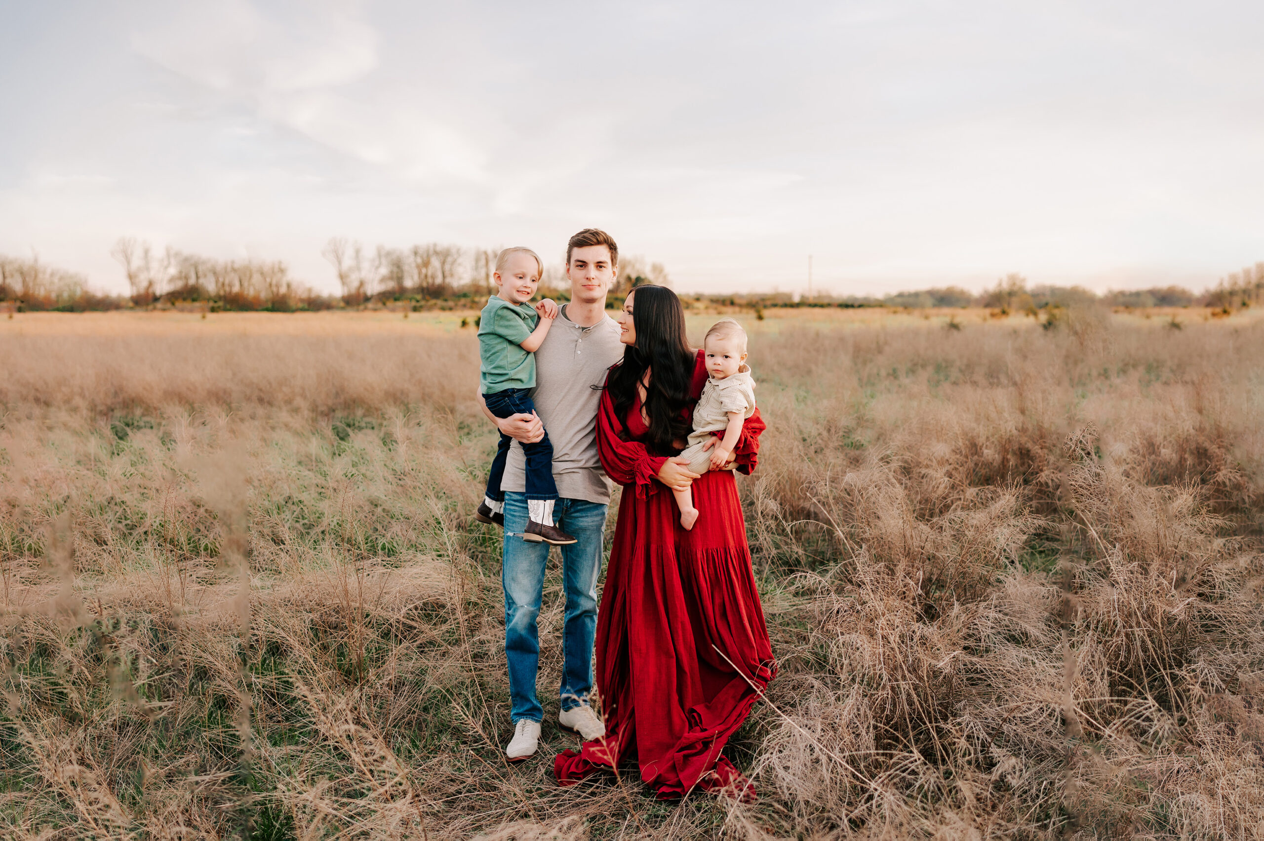 family playing in field captured by Springfield MO family photographer Jessica Kennedy of The XO Photography