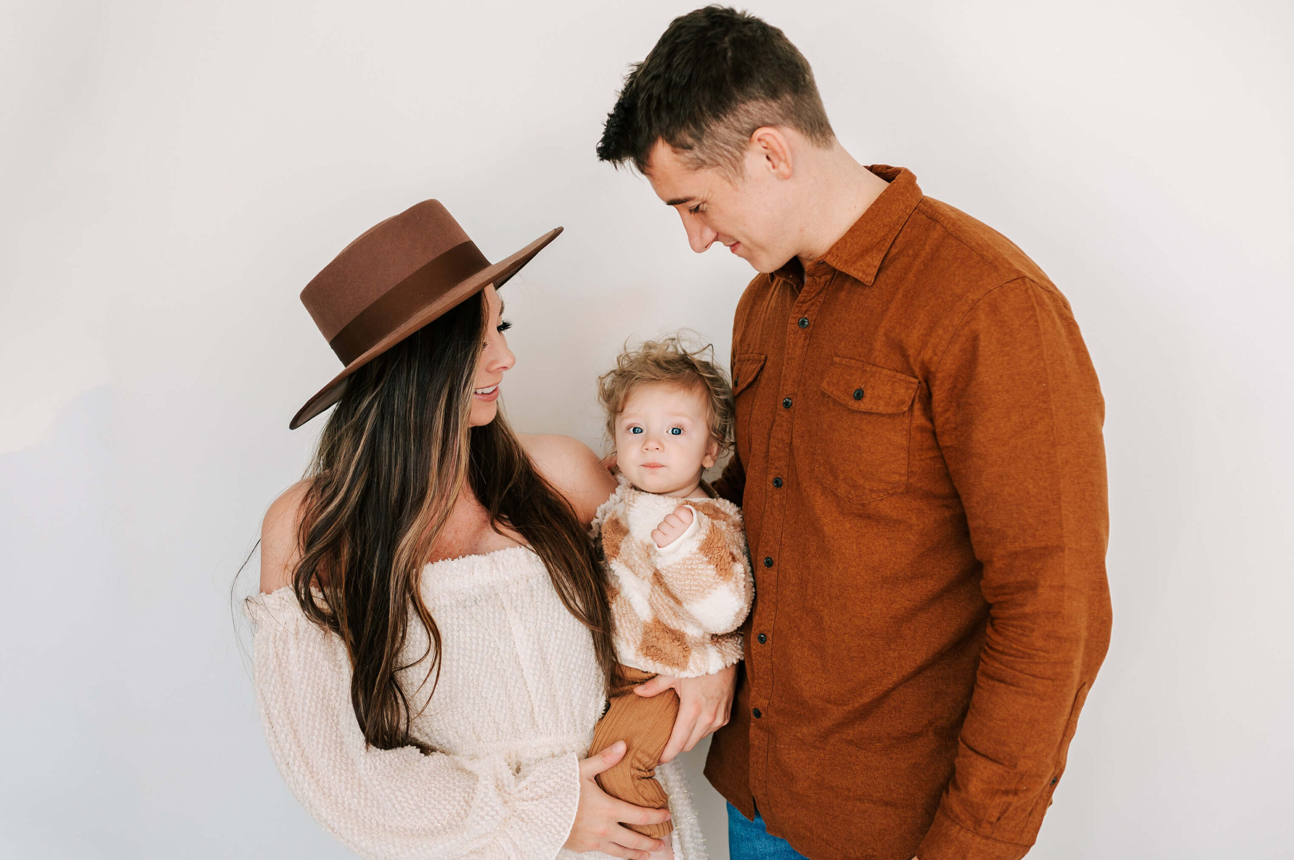 family holding baby boy during Springfield MO family photography session