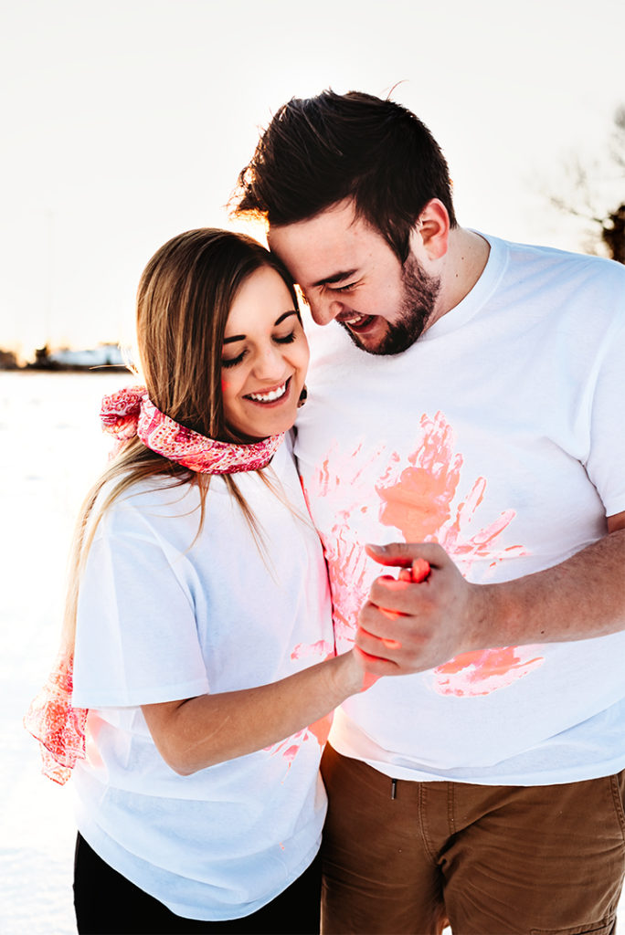 professional photographer in Springfield MO captures couple celebrating gender reveal