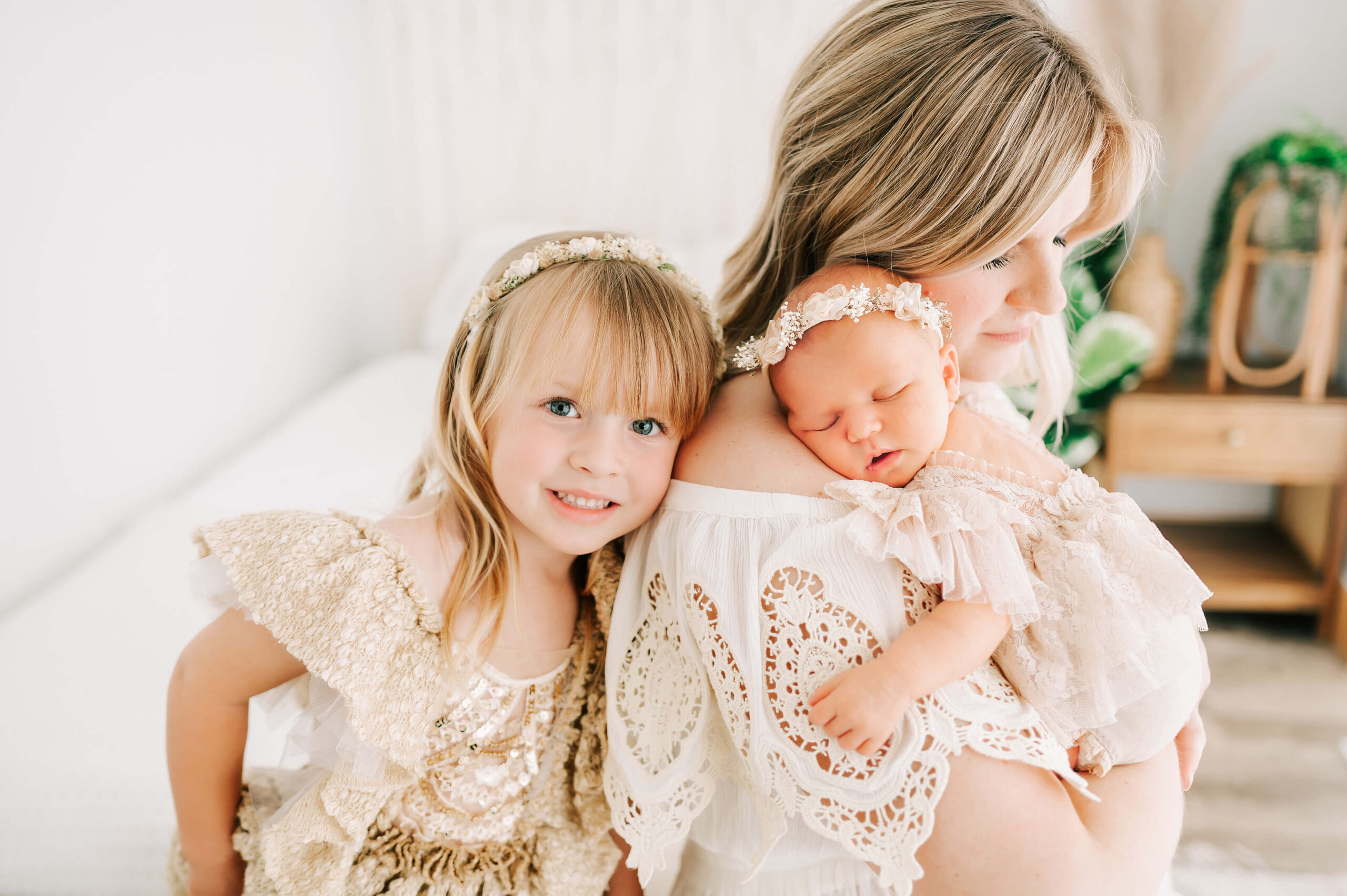 newborn photo in Springfield MO of mom and her girls in photography studio