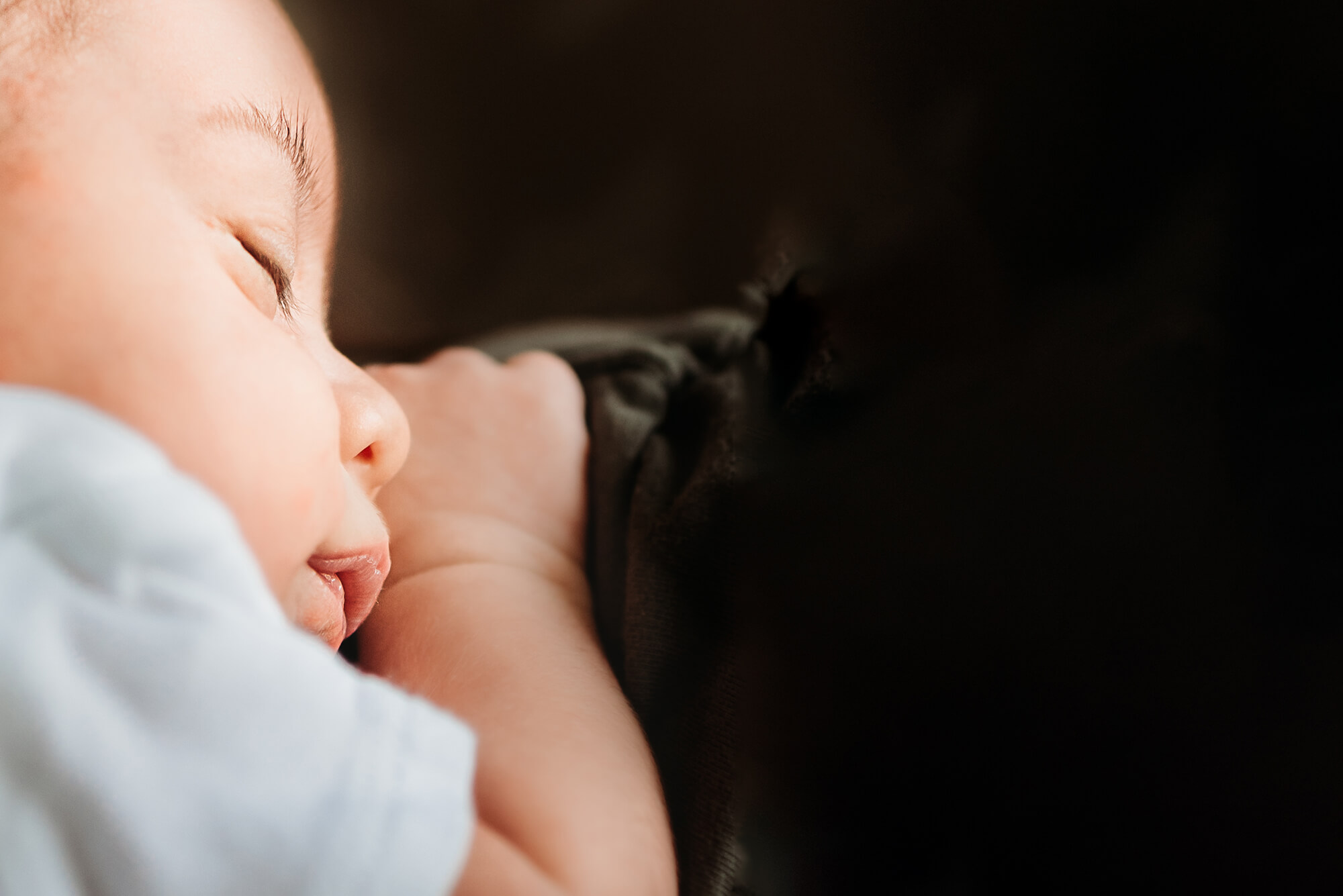 Kansas City newborn photographer captures sleeping newborn