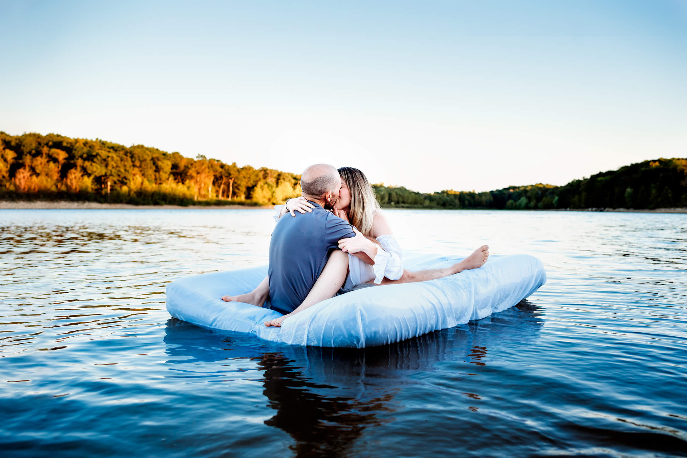 Springfield MO photographer captures couple kissing at a place to swim in Springfield MO