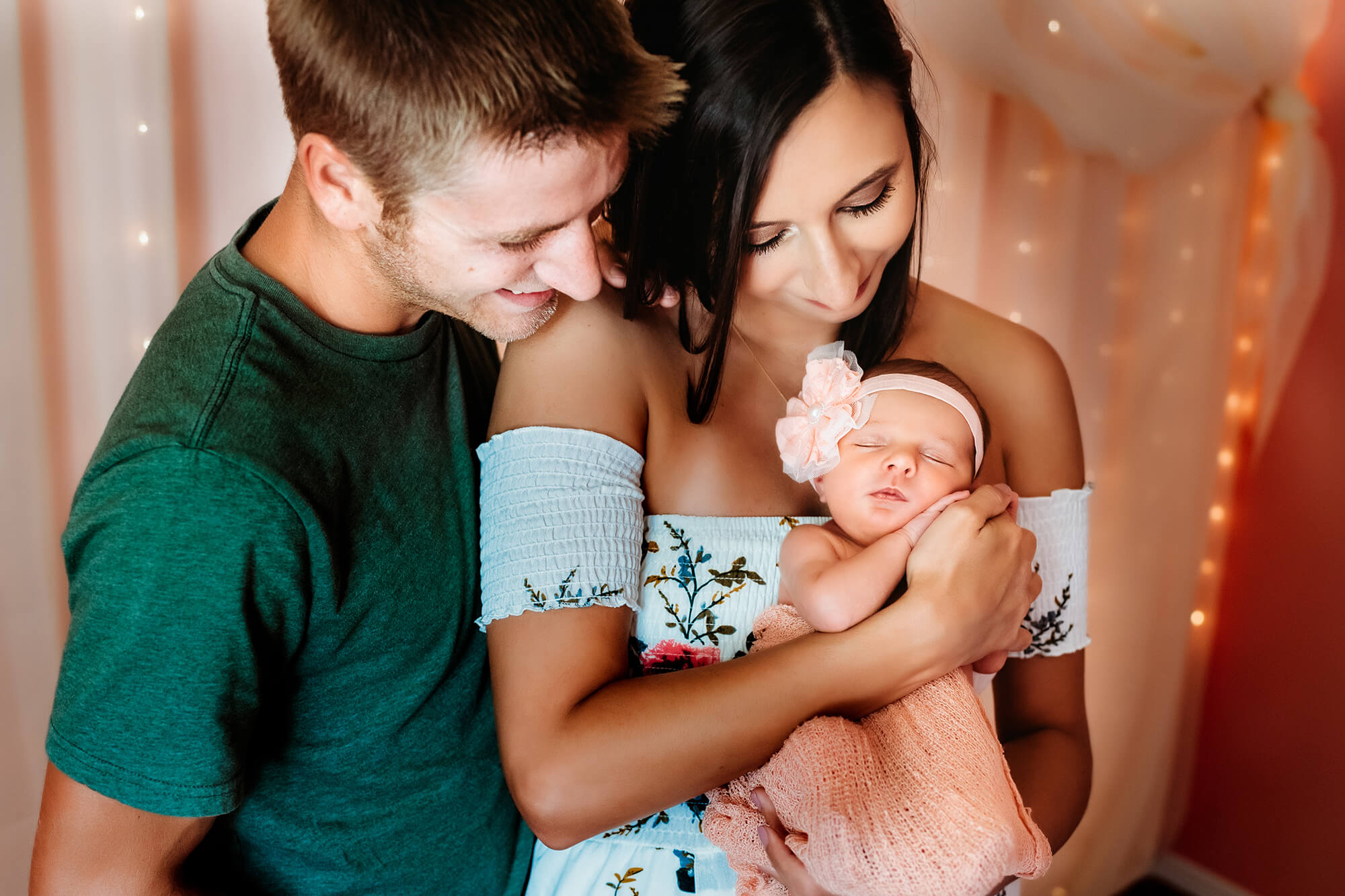 Springfield MO newborn photographer captures family cuddling after visiting mercy pediatrician in Springfield MO