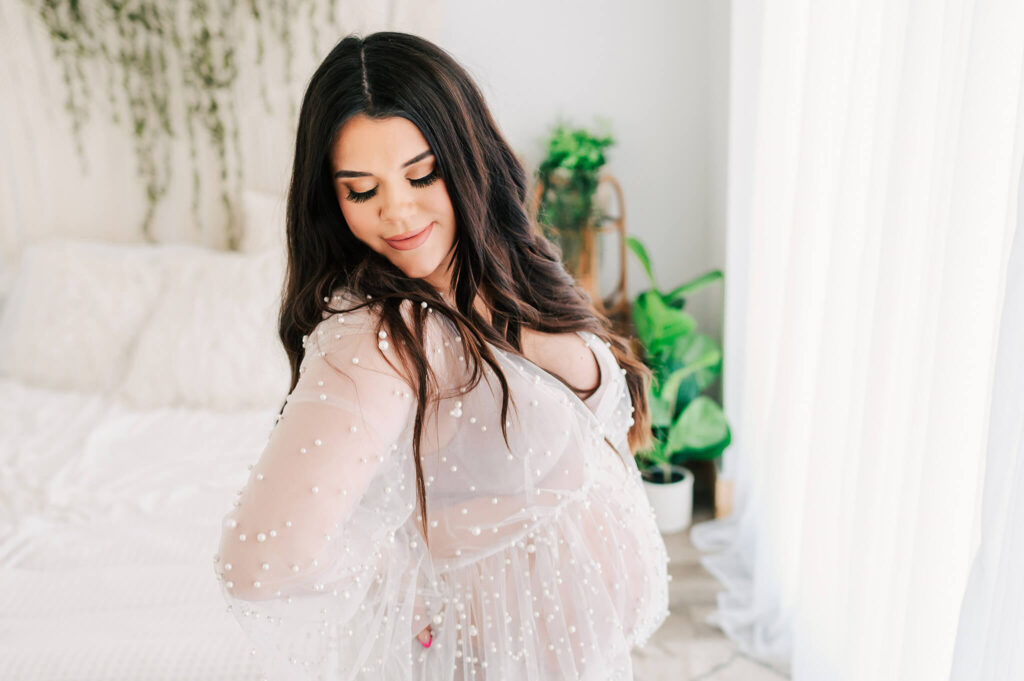 pregnant mom in lace dress captured by Springfield MO maternity photographer