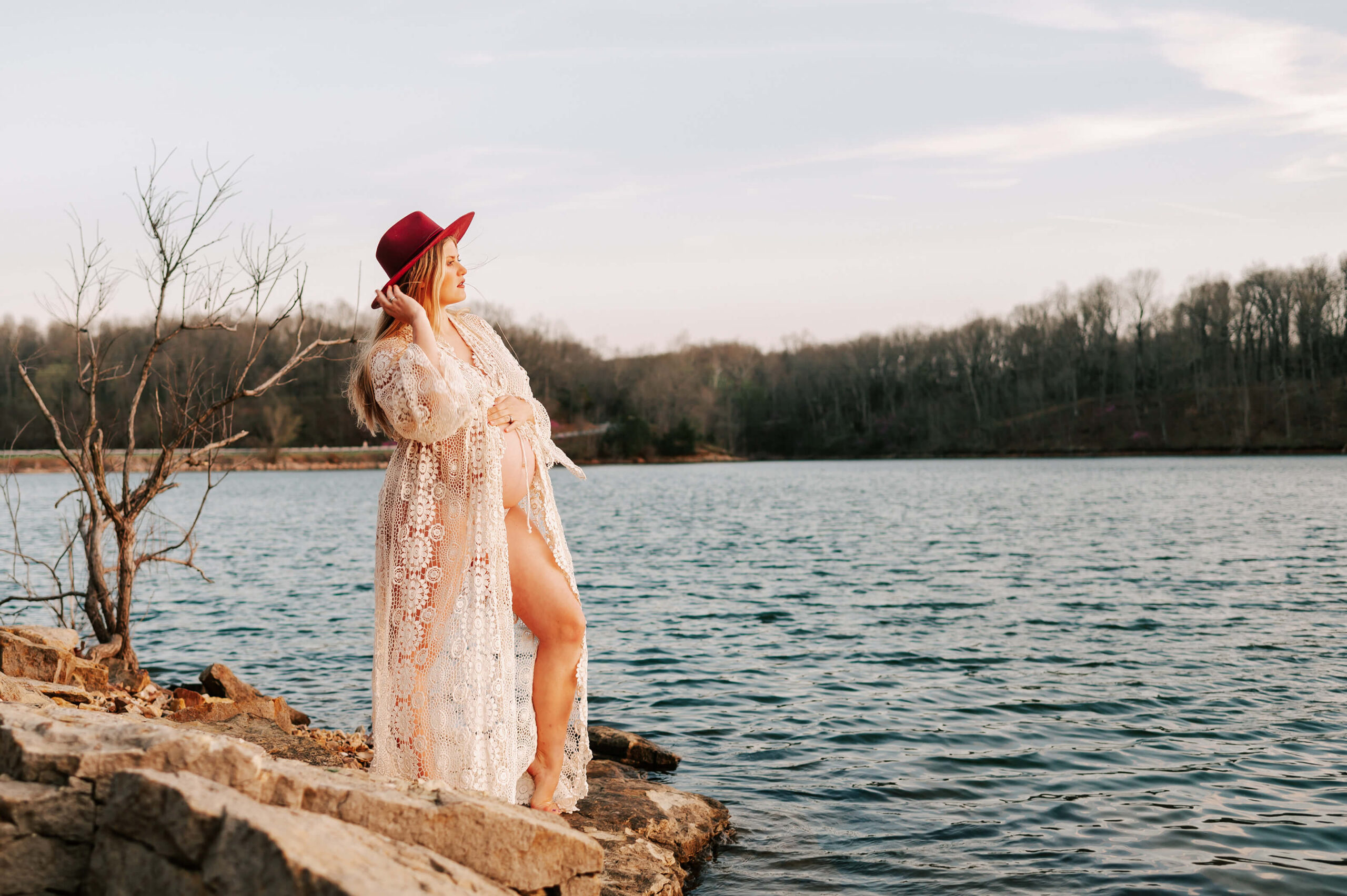 pregnant mom on lake captured by Springfield MO maternity photographer