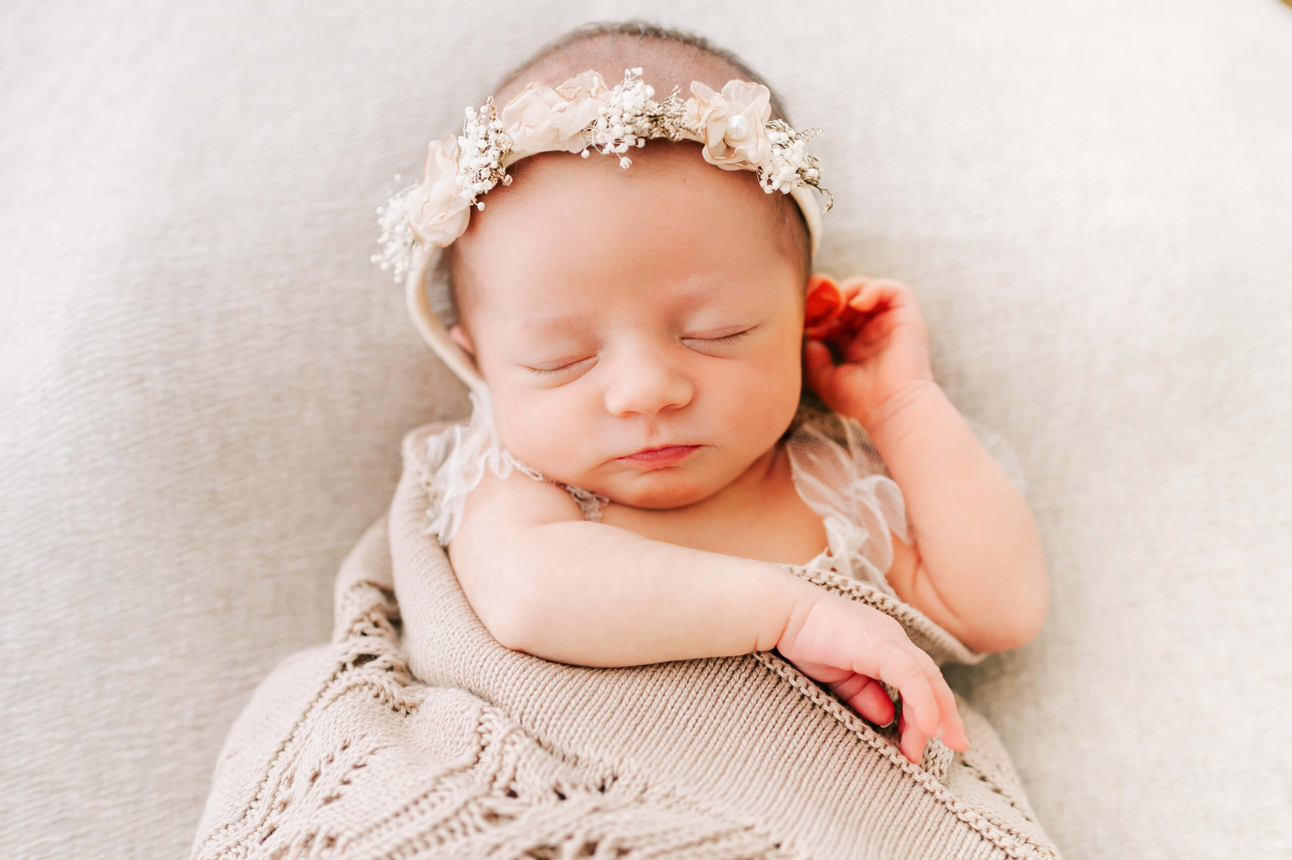sleeping baby girl in bed captured by Springfield MO newborn photographer Jessica Kennedy of The XO Photography