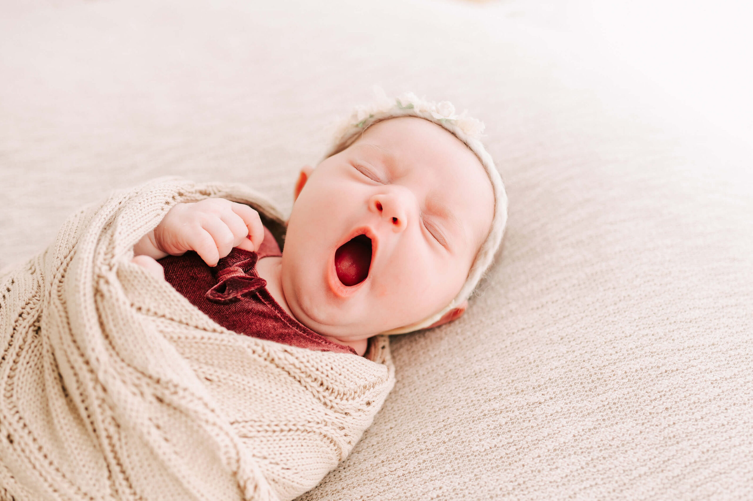 newborn baby girl yawning editing learned in photography business course