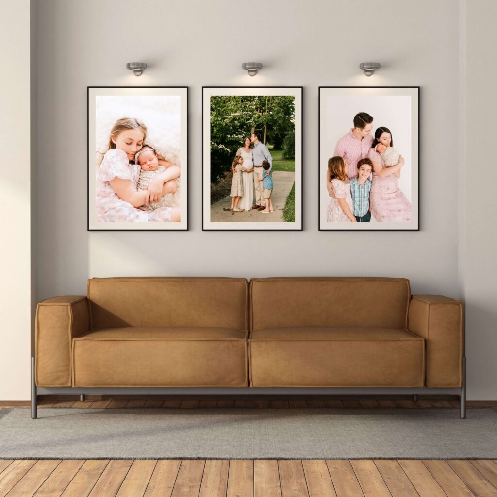 wall of framed maternity and newborn photos captured by The XO Photography